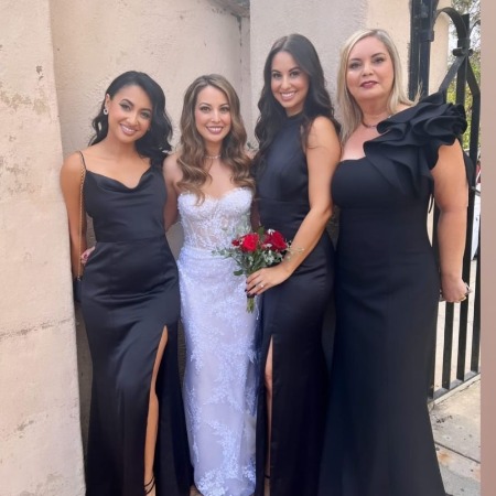 Renán Almendárez Coello's wife and three daughters at Italia Renata's wedding.